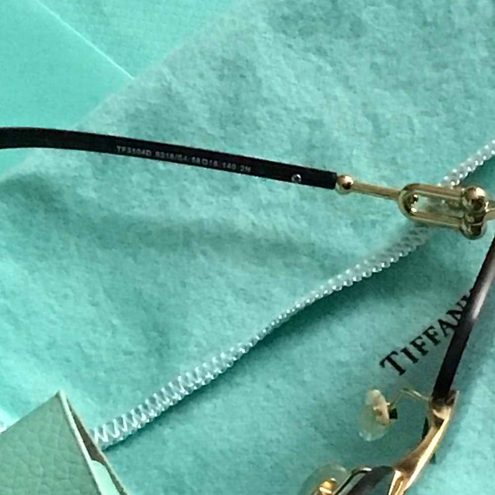 Tiffany & Co. Black Sunglasses with Gold Accents - Picture 7 of 9